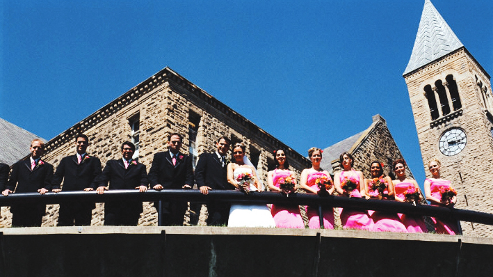 Alissa Bovee Terry ’02 & Stephen Terry ’02 above the Uris Fishbowl with their bridal party
