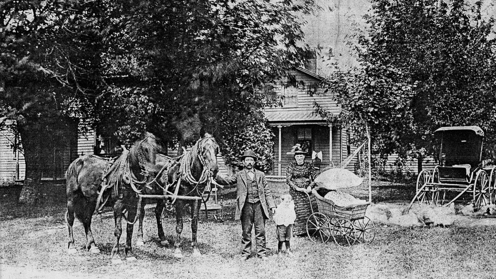 Melinda Perry Vizcarra's grandparents in front of their house where Becker Farms is with horses and their children.