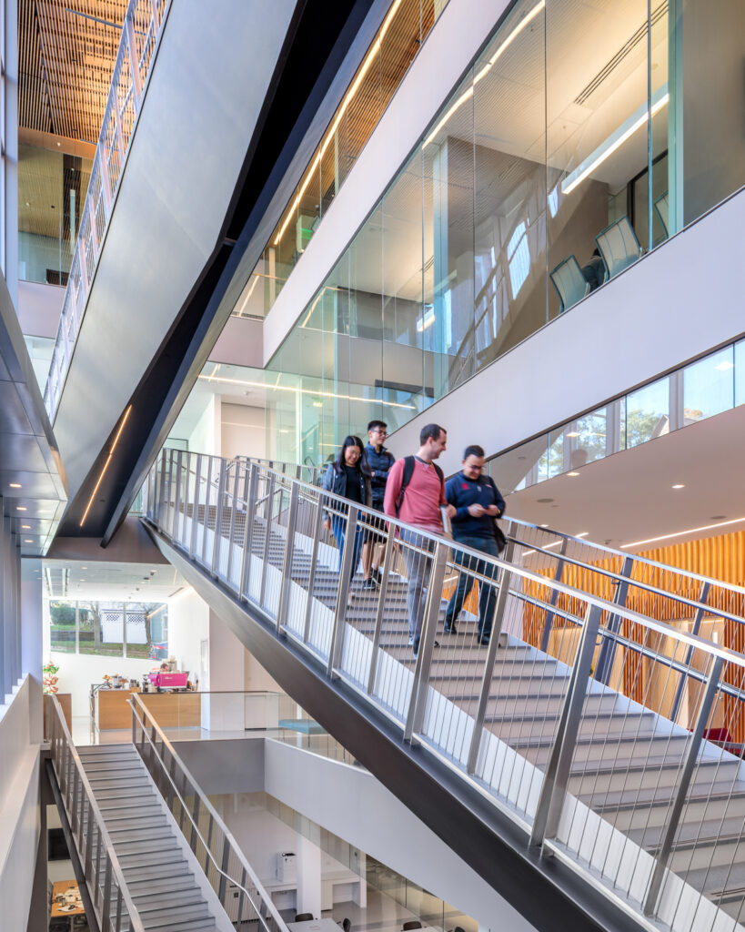 Photo by Brad Feinknopf ’86 of the interior stairways and floors of the Breazzano Family Center at Cornell in Collegetown