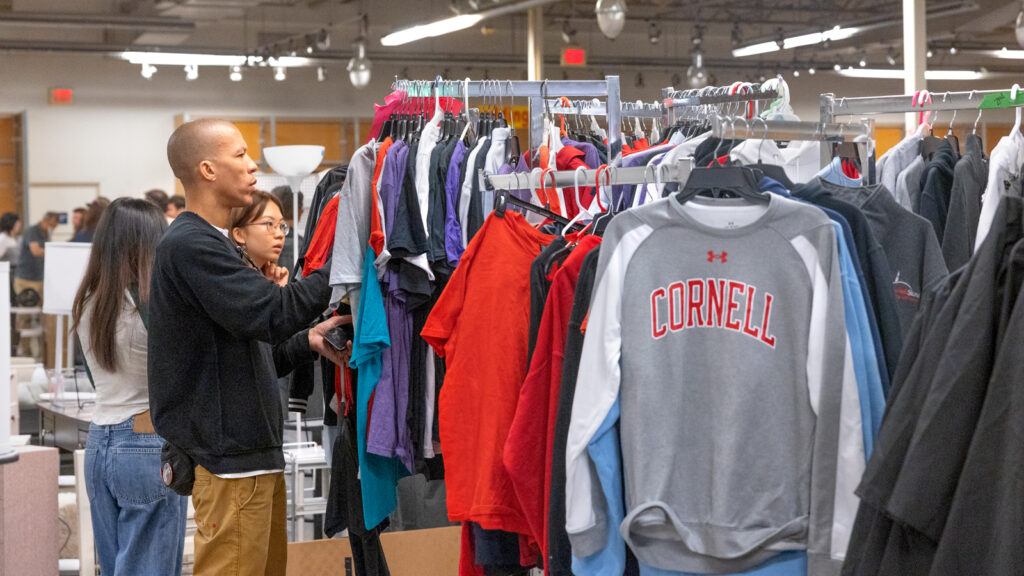 Families shopping for Cornell gear at the Dump & Run sale