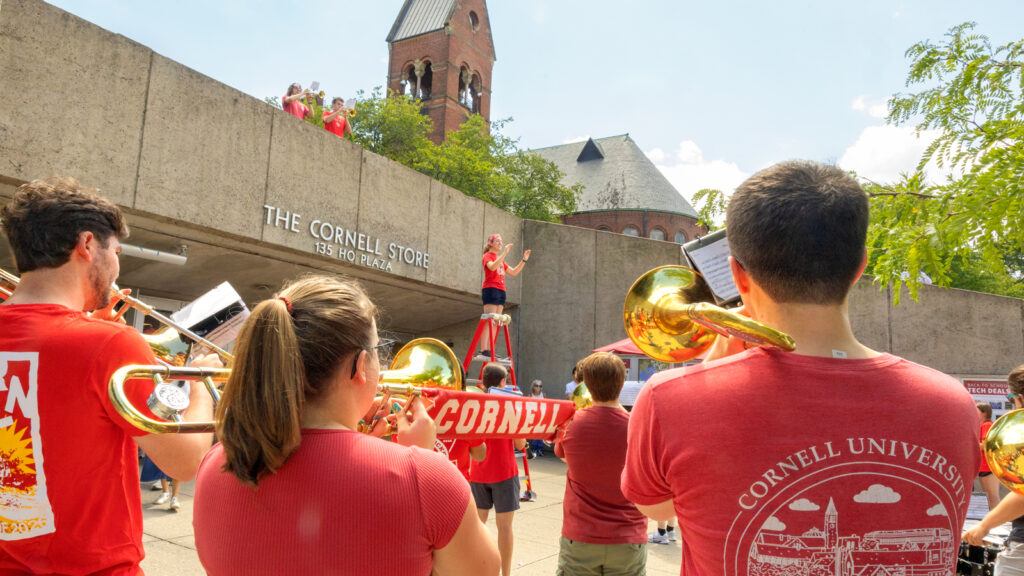 members of the Big Red Marching Band perform on Ho Plaza outside the Cornell Store during Move-In events, August 2026