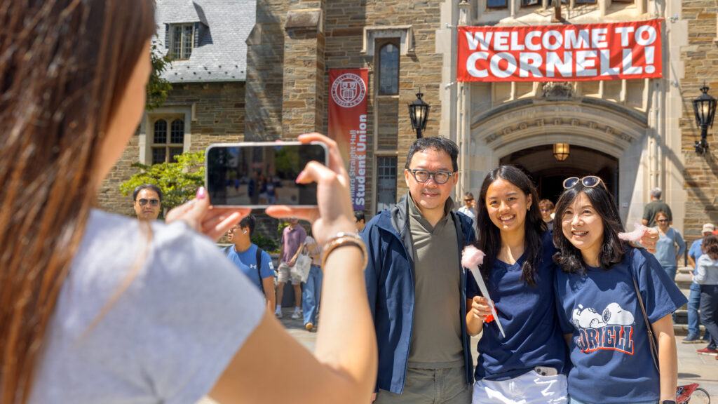 students and parents take photos on Ho Plaza during new student activities and events, August 2026