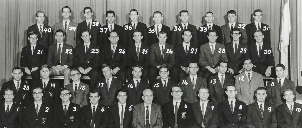 A group shot of men in jackets and ties who were in the Cornell 5-year engineering program in the 1960s