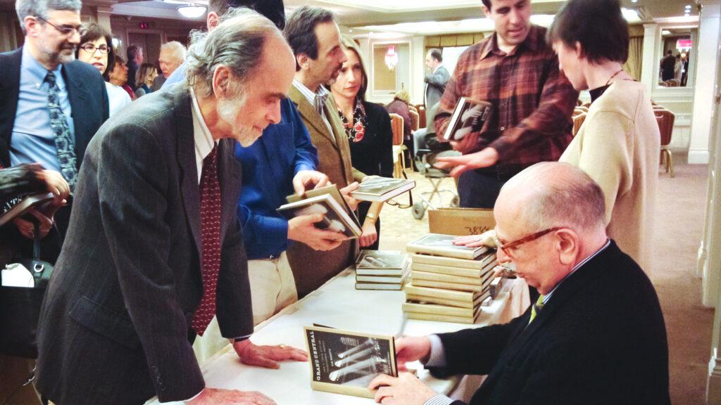 Sam Roberts signing books at the Cornell Club in NYC