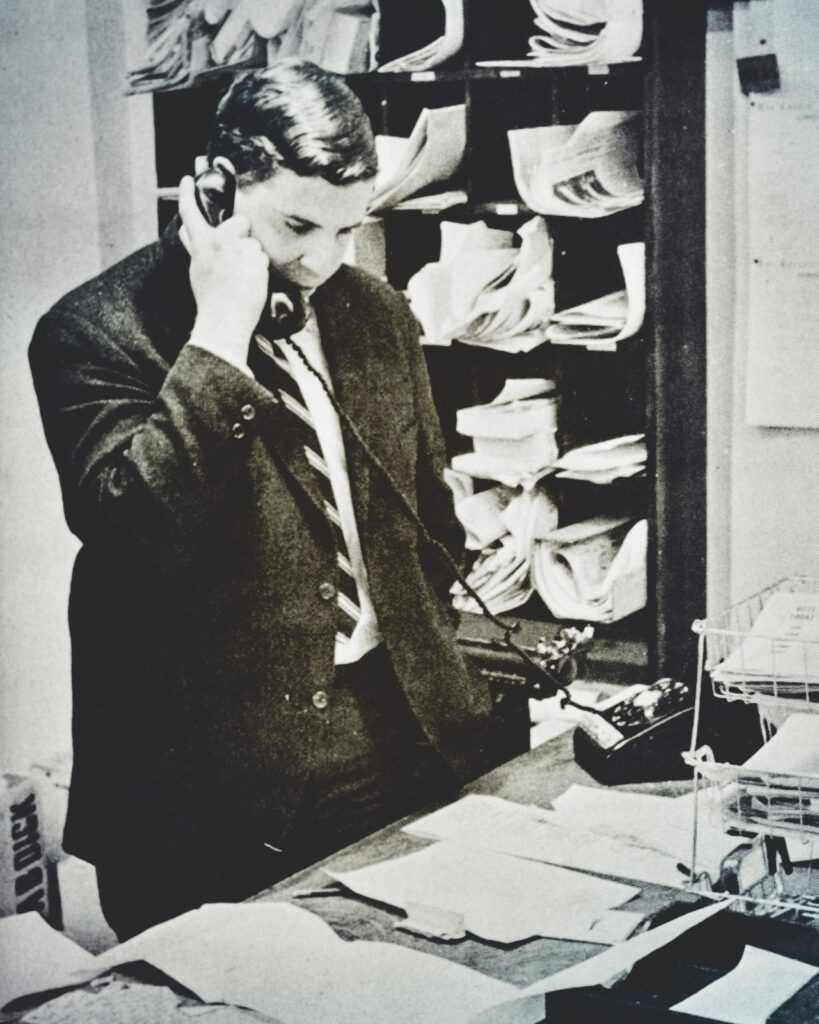 Sam Roberts talking on the phone during his days as managing editor of the Cornell Daily Sun.