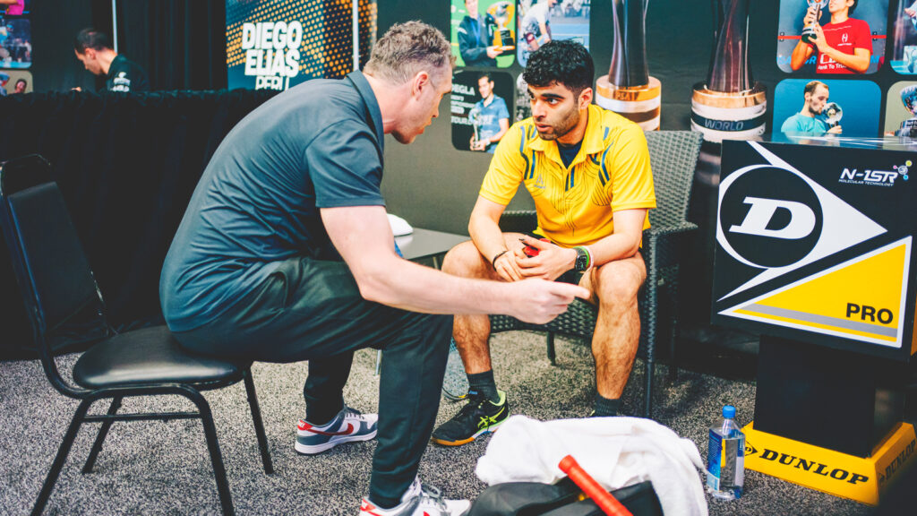 Veer Chotrani talks with a coach during the World Championships.