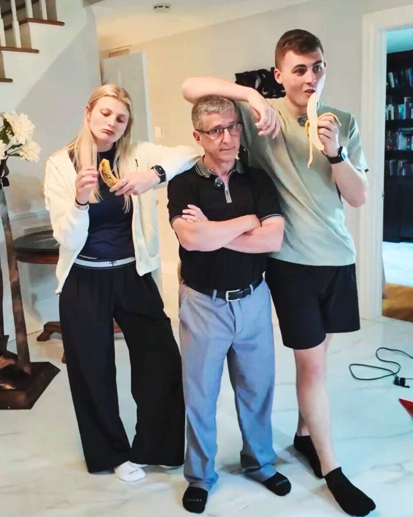 still image from a Dr. Dan TikTok video showing Dan Cohen with two of his kids