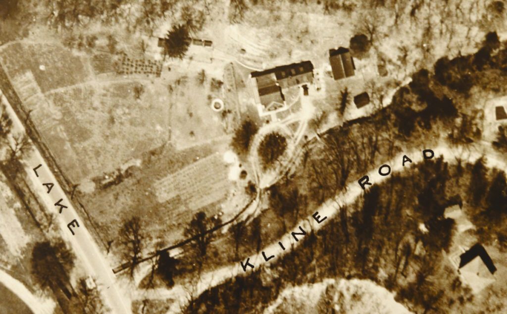 A vintage aerial photo showing Kline Road, Lake Street, and some buildings