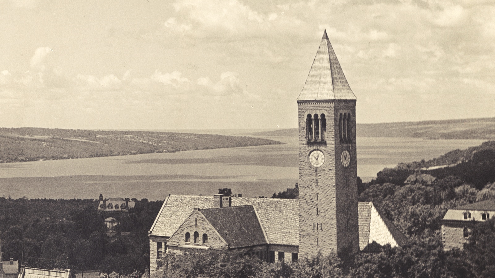 A vintage view of the Cornell tower and Cayuga lake in the 1920s