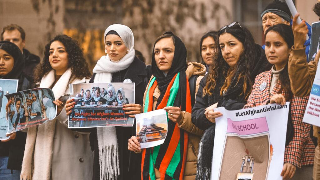 Mursal Rahim stands with other woman during a rally on campus to raise awareness for women in Afghanistan.
