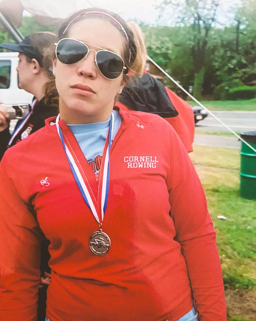 Alison Leiby in red Cornell Rowing gear