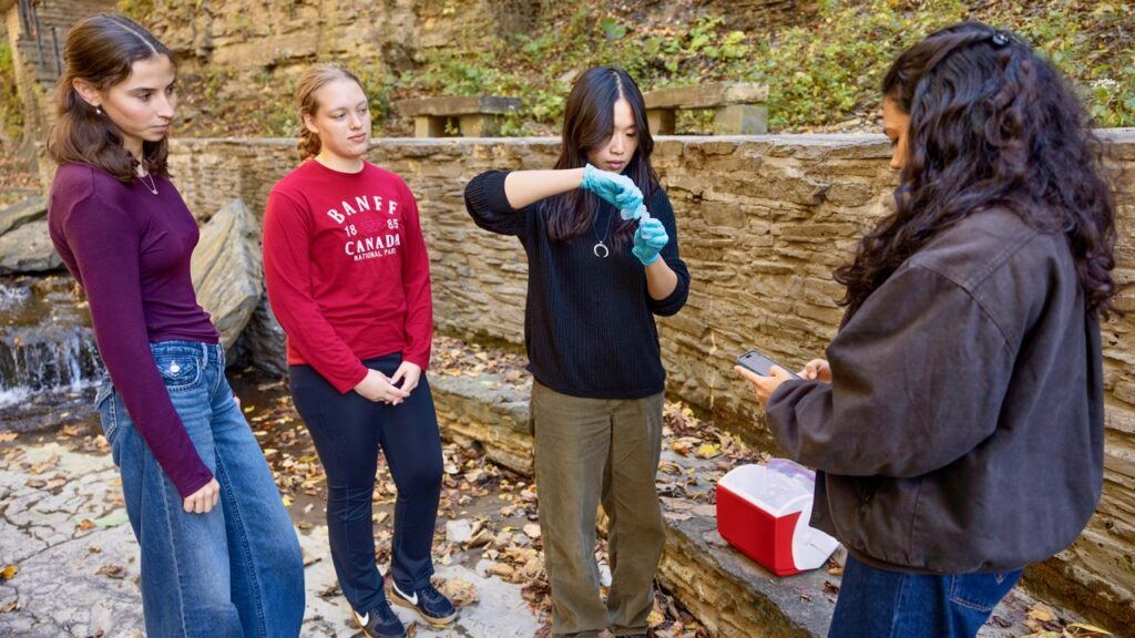 Students in the research group of Damian Helbling, professor in the Cornell Duffield College of Engineering, test for per- and polyfluoroalkyl substances (PFAS) in Cascadilla Gorge on Oct. 6.
