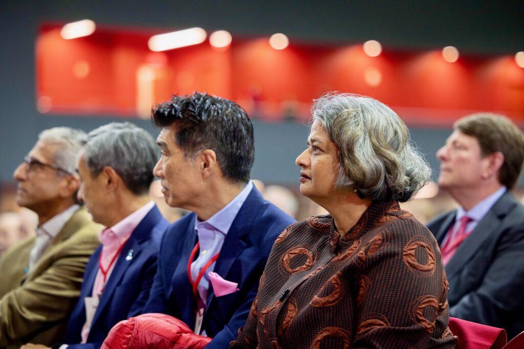 Provost Kavita Bala, right, and others in the audience listen as President Michael Kotlikoff delivers the State of the University Address October 15, 2026 in the new Meinig Fieldhouse