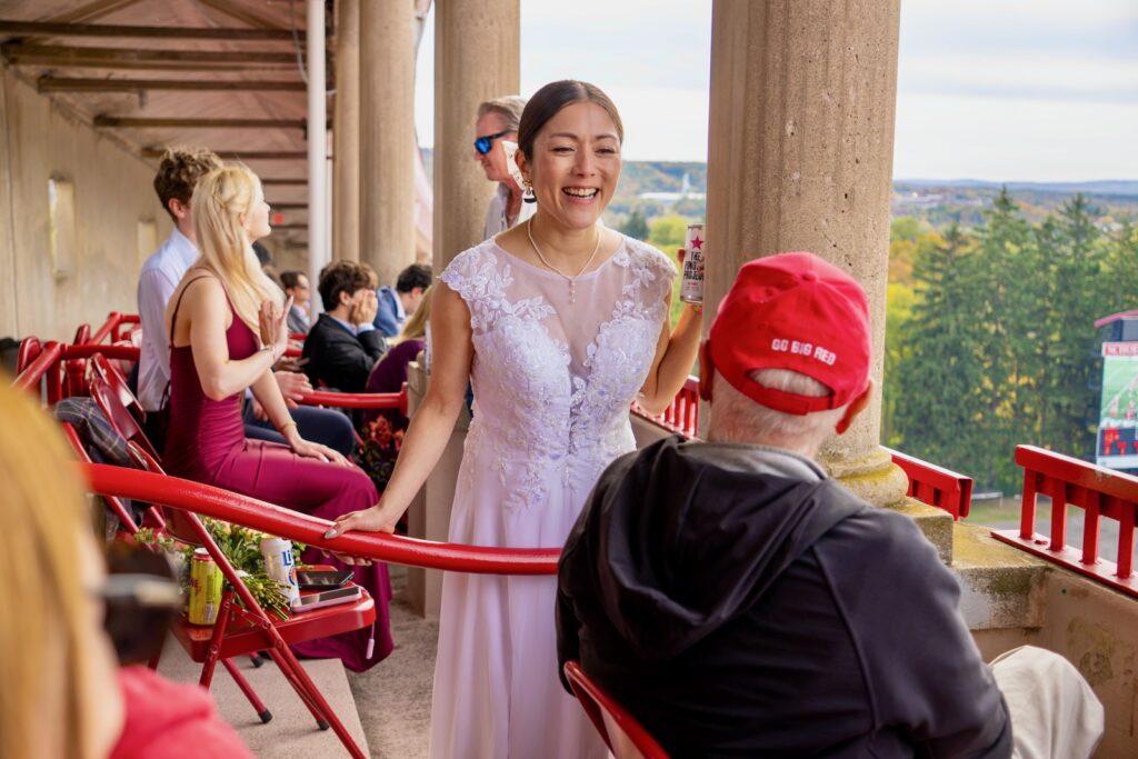 Yuko Jingu talks with a guest at the wedding.