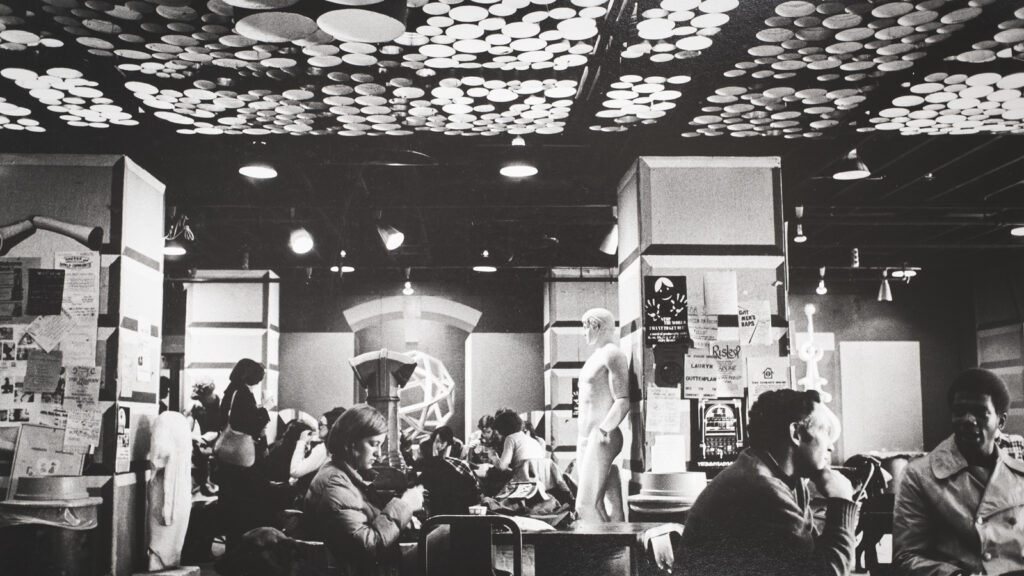 view of AAP students and faculty in the Green Dragon Café in 1976