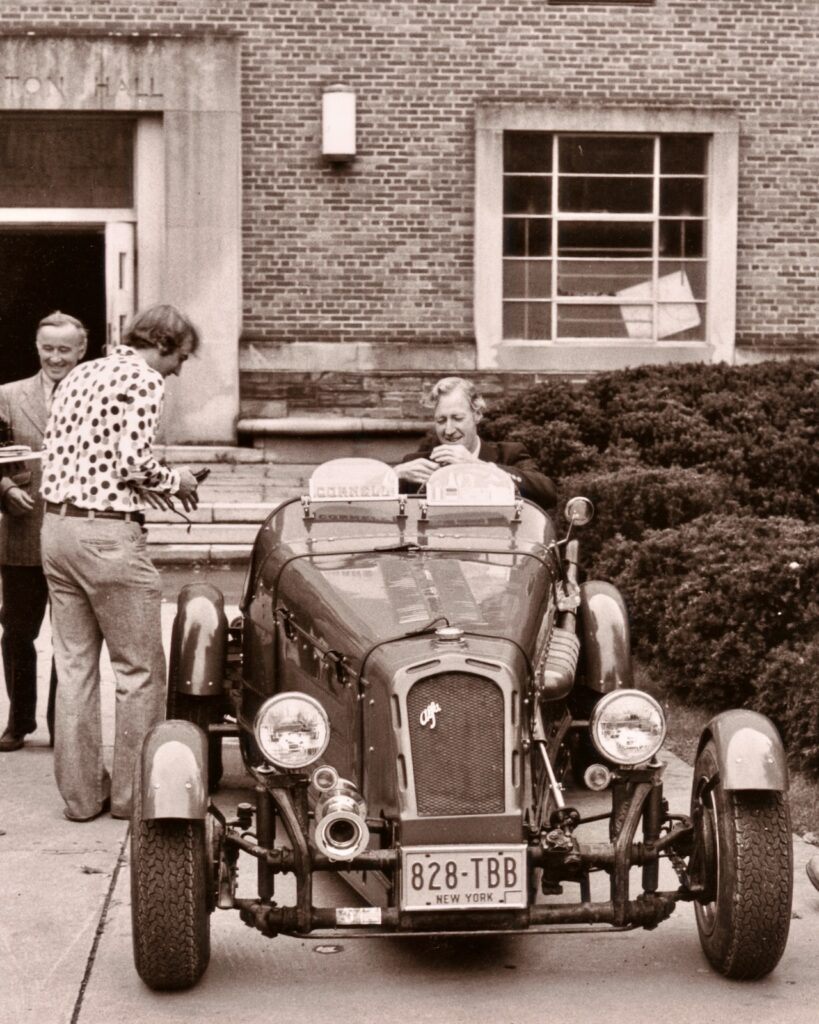 Frank H.T. Rhodes checks out the Engineering college’s experimental electric car in 1977