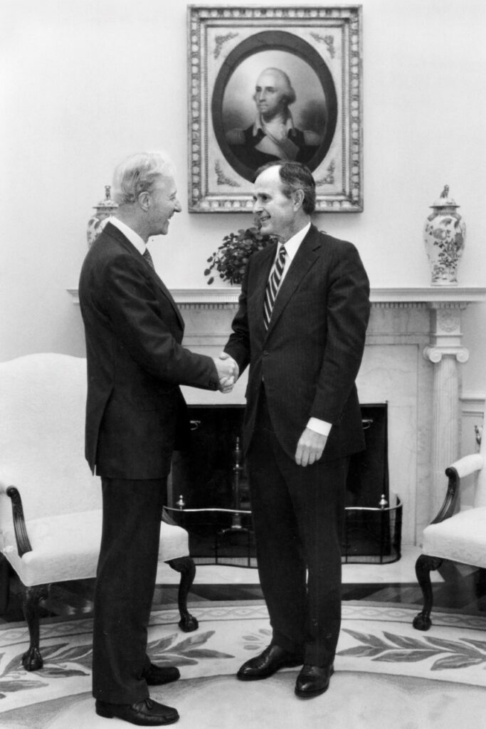 Frank H.T. Rhodes with then-U.S. President George H.W. Bush in Washington, DC, in 1989