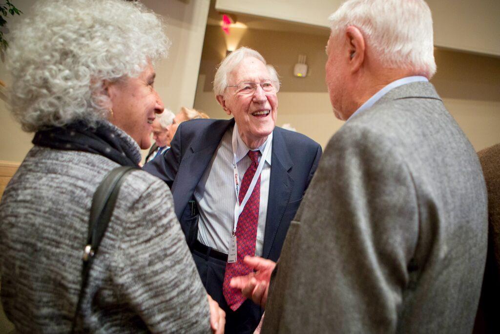 President emeritus Frank Rhodes chats with attendees at the 2016 Frank Rhodes 90th Birthday Symposium held in his honor