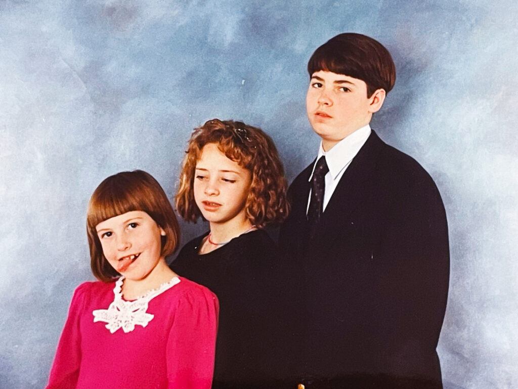 Alex Colket in a vintage family portrait with his two sisters