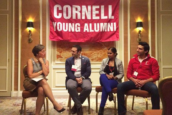 Young alumni engage in a conversation with Susan Murphy. Left to right - Shane Dunn, Kat Balram, and Ruben Ortega.