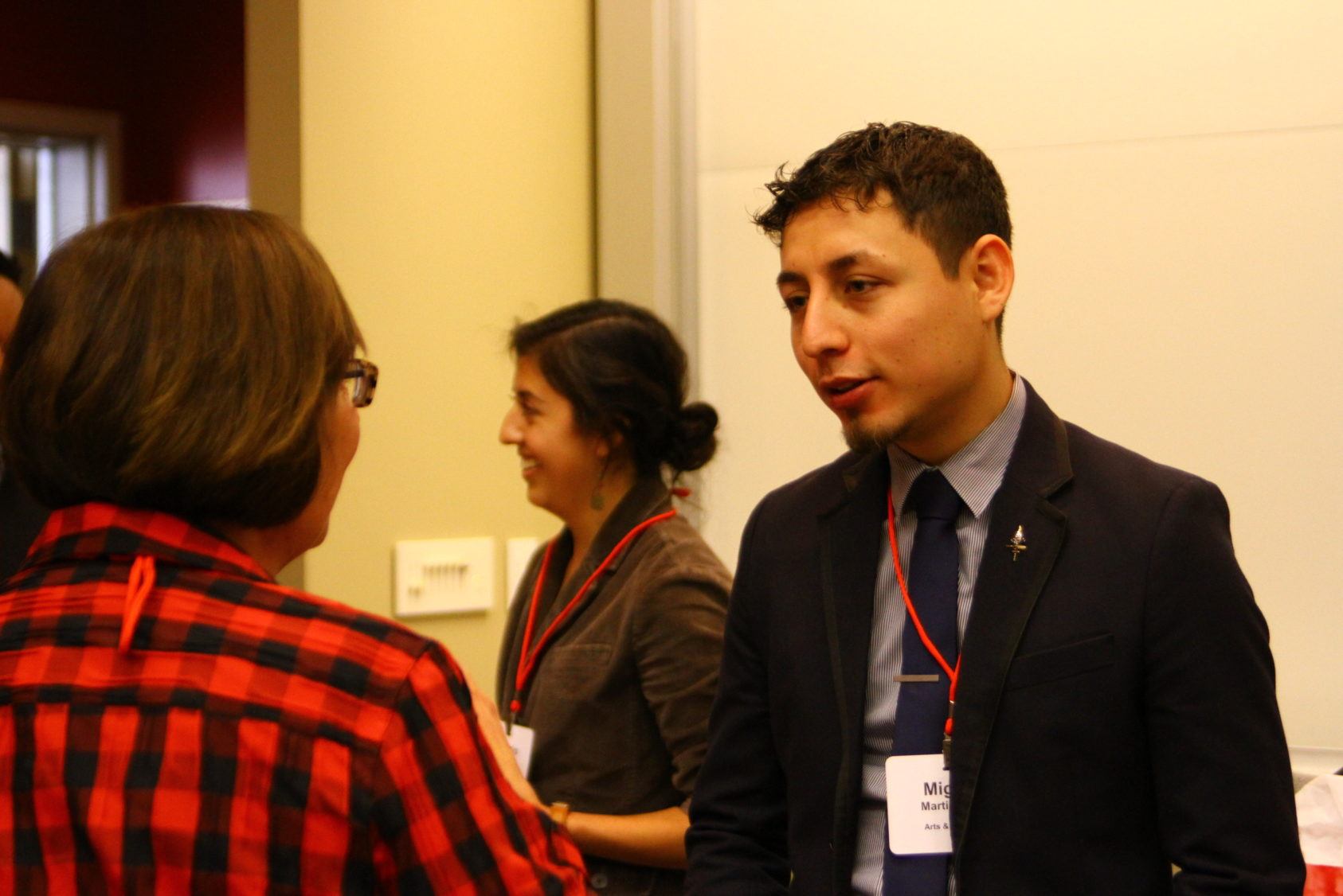 Miguel Martinez chatting with a TCAM attendee