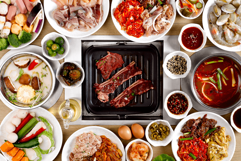 Various Korean dishes displayed on a table