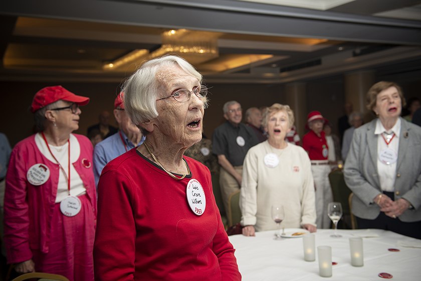 Lois Crane Williams ’53, back for her 65th Reunion, joins in singing the alma mater.