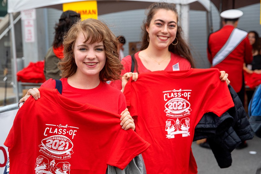 Students appreciate the Homecoming t-shirt giveaway.