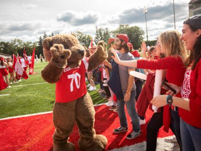 Touchdown the bear greets fans at Homecoming 2018.