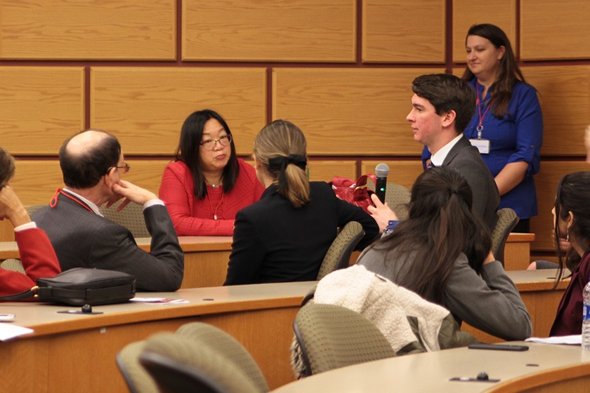 A student tells alumni about his work with the Cornell Prison Education Program.