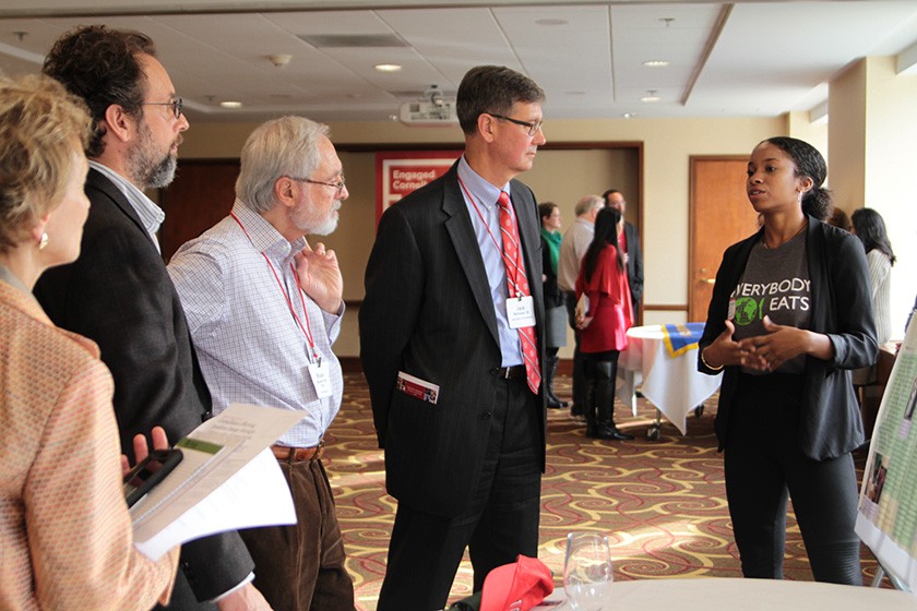 Imani Majied ’19 explains her social enterprise, Everybody Eats, to members of the Cornell University Council.