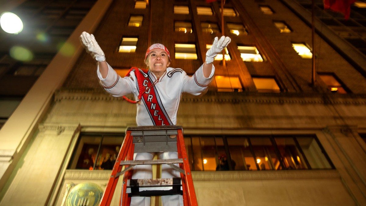 Drum major Katherine Curtis '19 directs the Big Red Marching Band in a concert outside the Cornell Club-New York.