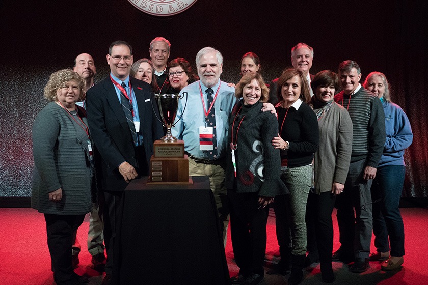 A group of alumni after winning the Cornell Alumni Association Cup