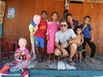 Oliver Campbell '82, MEng '84 with a grounp of young people in Indonesia