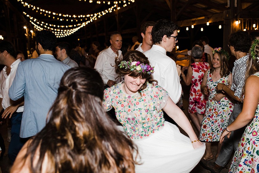 Wedding guests dance at an Ithaca Farmers Market reception