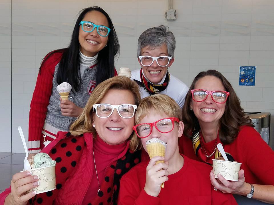 Terri Port started a tradition of taking the children of her friends to the Cornell Dairy Bar. “Sometimes the adults want to get in on the visit,” she says. (From top left) Karen Lim, Class of 1994, MBA Class of 2002; Lindsay Liotta Forness, Class of 1984; (front row) Terri Port, Class of 1984; Harry Whaley Jr.; Christine Miller Whaley, Class of 1984
