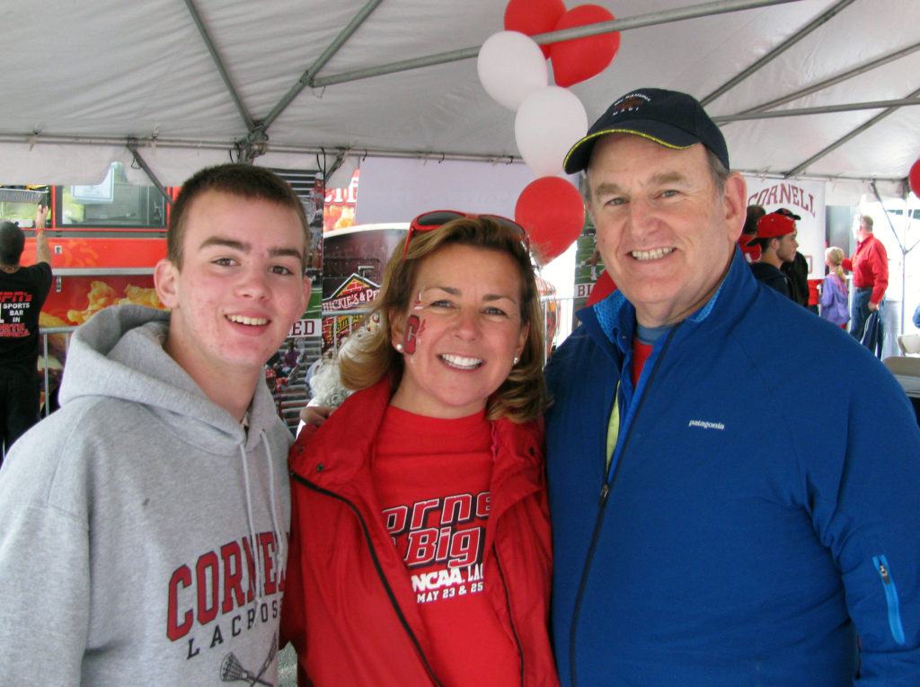 Terri Port with her family at the 2013 NCAA Lacrosse Championships in Philadelphia, where Cornell went up against Duke in the semifinal match: (left to right) Terri’s son Harry Port McClellan, Terri Port, and Terri’s husband, Steve Lishansky.