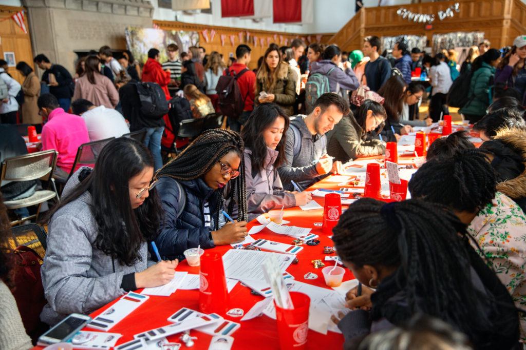 Students write thank you cards to alumni donors on Giving Day.