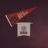 Big Red pennant, Dad banner, and diploma