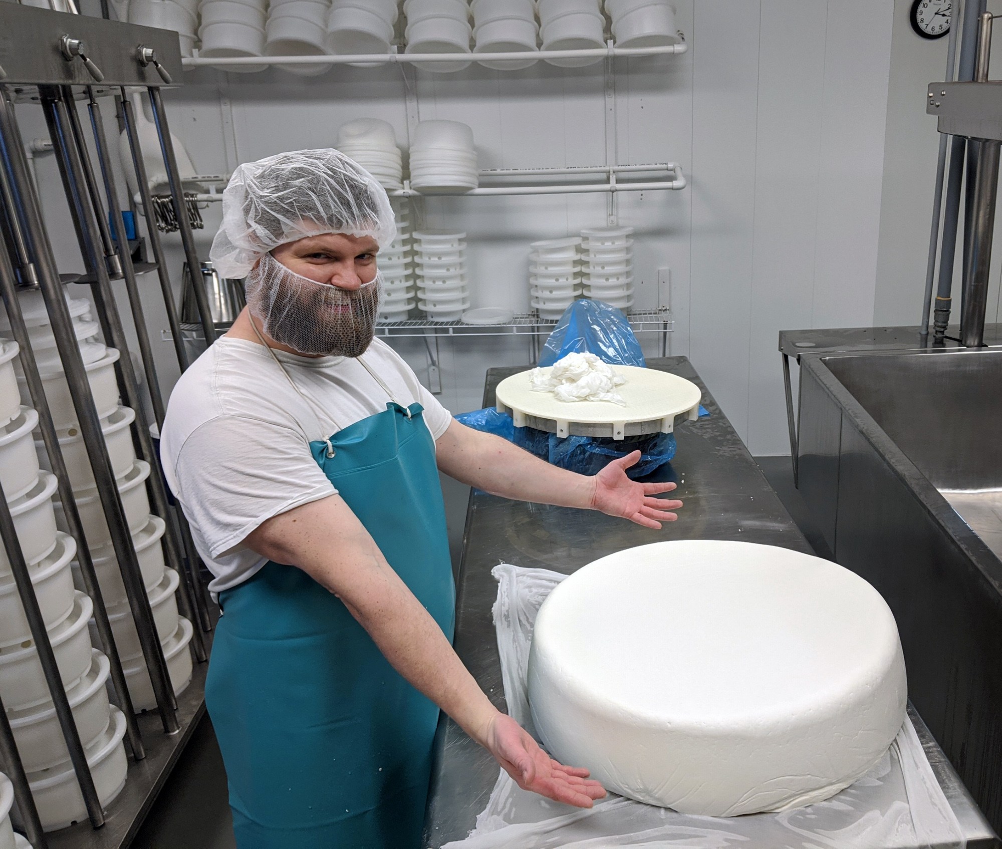 Pete Messmer with Finger Lakes Gold Reserve cheese.