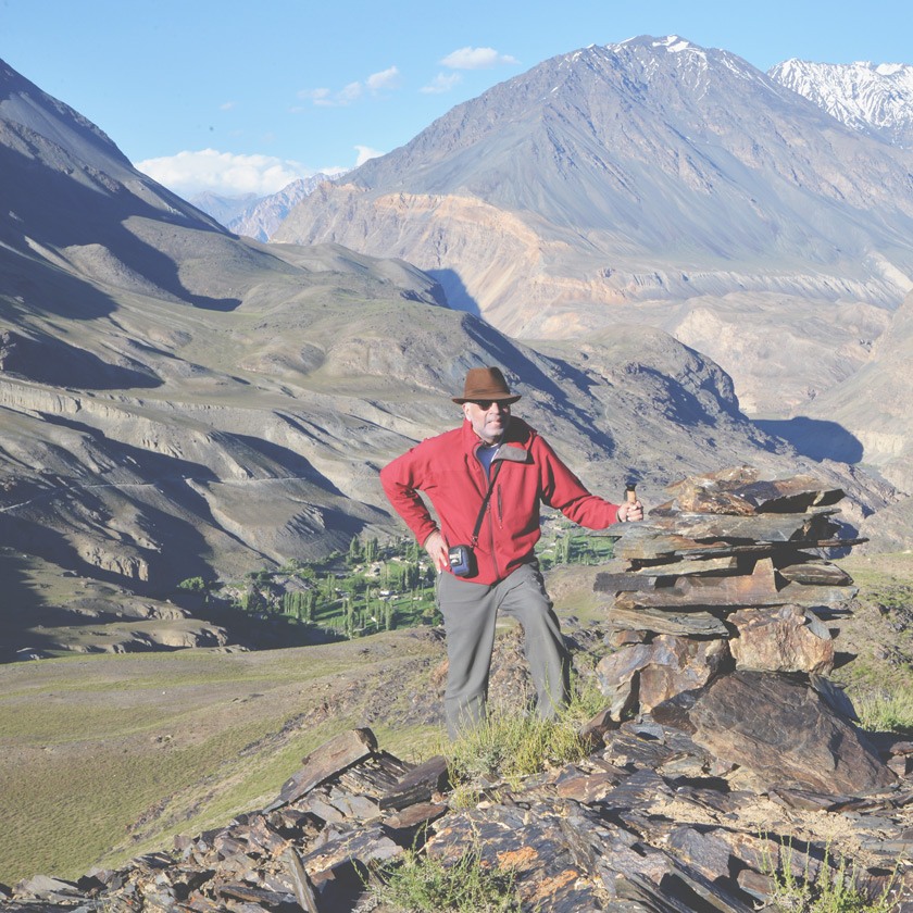 Karim-Aly Kassam in the Pamir Mountains, overlooking the village of Savnob in GornoBadakhshan Autonomous Oblast, Tajikistan. 