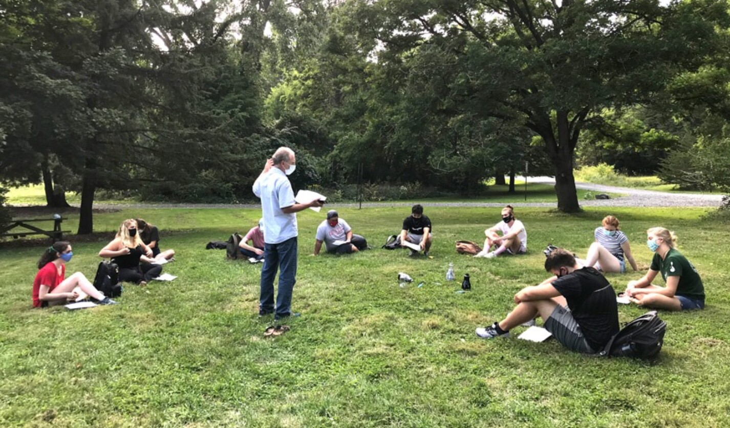 Professor Louis A. Derry working with his biogeochemistry students on a soil carbon experiment at Cornell Botanic Gardens.