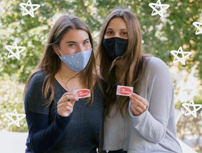 Members of Kappa Alpha Theta and Sigma Delta Tau committing to having a full voter turnout from their chapters. Credit: Hannah Rosenberg and the Cornell Daily Sun