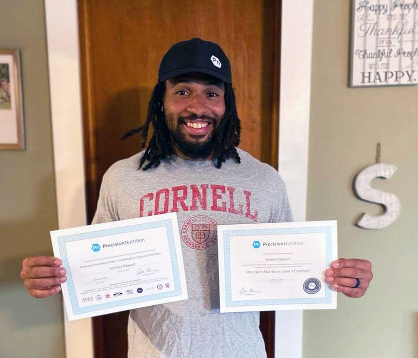 Jeremy Stewart proudly displays the Precision Nutrition Certification he earned during the pandemic.