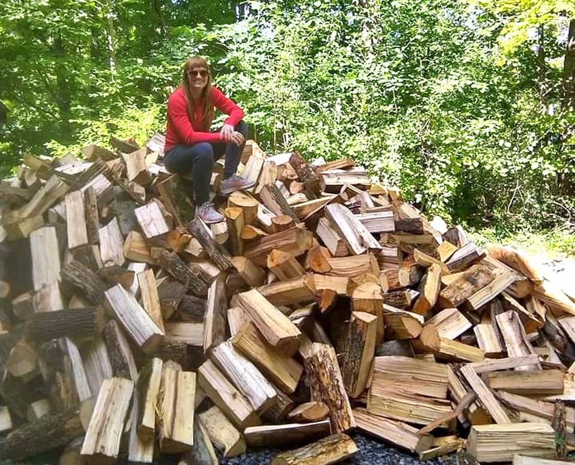 One of the ways Keri Johnson stays active in the fall and winter is by chopping fire wood!