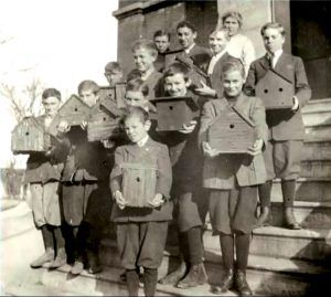 Students at the Cornell Nature Study School holding their birdhouses. The school was founded in 1897 by Anna Botsford Comstock and Liberty Hyde Bailey and offered lectures, lab work, and field work in the areas of insect, plant, and farm life.