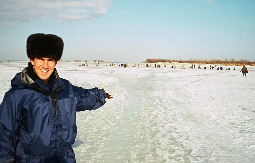 After graduation, Sam Sezak ’98 was a Peace Corps volunteer in Ukraine, where he worked with small businesses. Here, he is watching locals ice fishing on the Dnipro River.