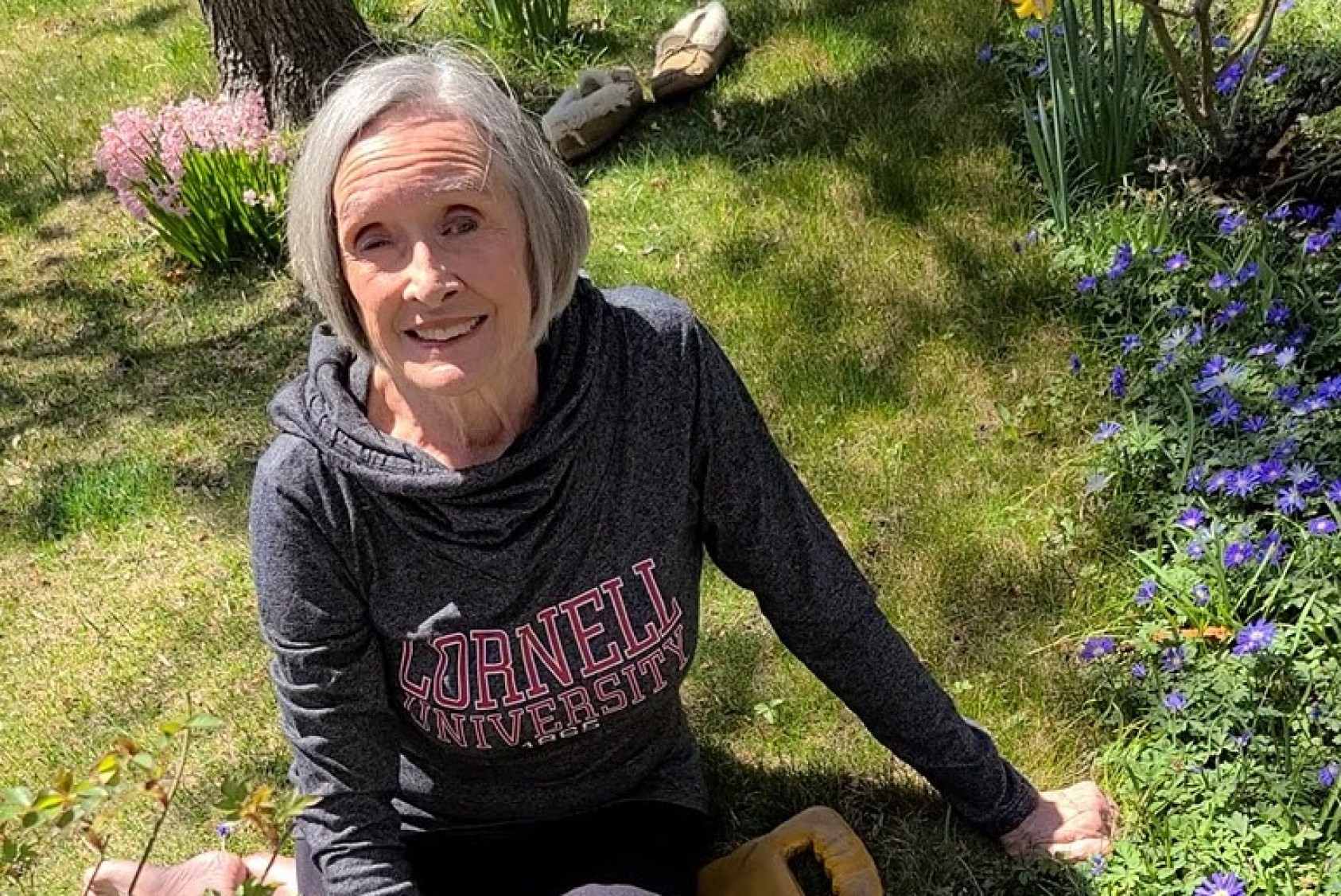 Carolyn working in her garden. “Lots more fun than dusting!” she says.