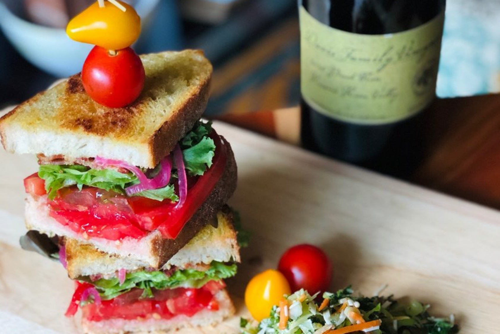 One of Blake’s culinary creations: Beef Master and Cherokee Purple heirloom tomatoes, toasted sourdough, Nueske Wisconsin smoked bacon, arugula, roasted garlic aioli, pickled shallots