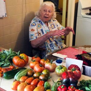 Marie Novak, garden consultant, looks over the day’s harvest.